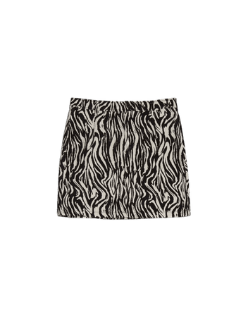 Fitted needlecord mini skirt with asymmetric printed hem - Skirts - Woman | Bershka