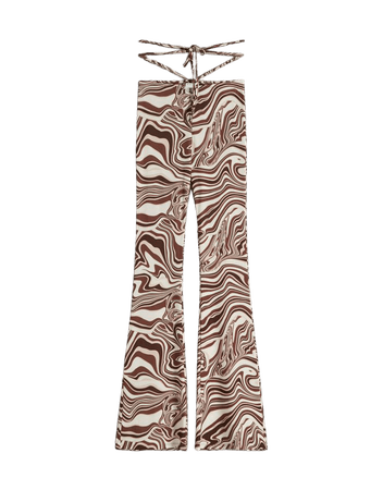 Printed flared pants with ring detail - Pants - Woman | Bershka