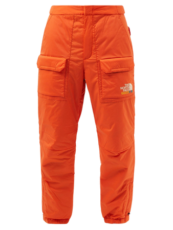 Gucci north face orange pants