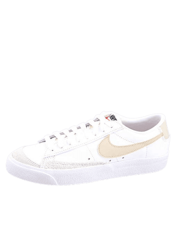 Nike Blazer Low '77 VNTG sneakers in white/pale coral | ASOS