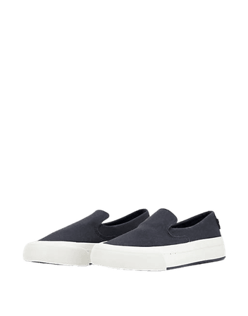Levi's slip on low canvas shoes in black | ASOS