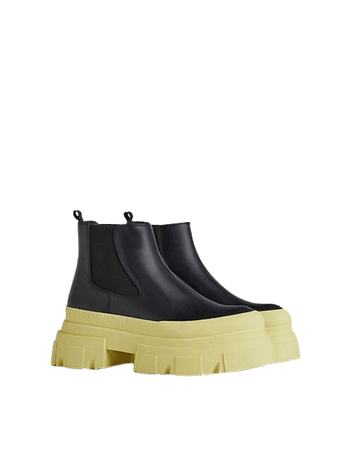 Bershka chunky flat chelsea boot with contrast yellow sole in black | ASOS