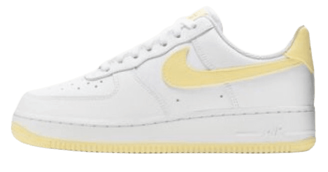 White and yellow Nike sneakers
