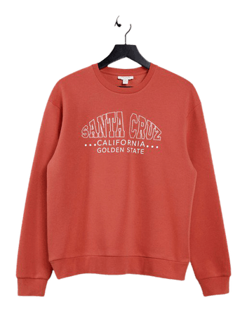 Topshop oversized 'santa cruz' slogan sweatshirt in rust | ASOS