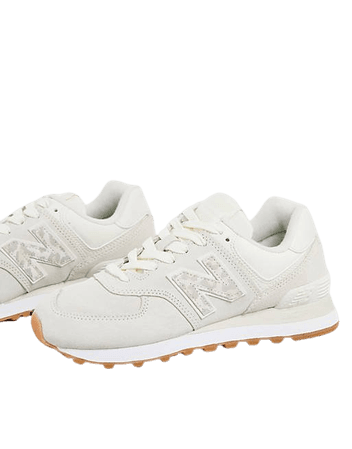 New Balance 574 sneakers in white and animal print | ASOS