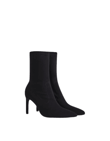 Bershka mid heeled sock ankle boot in black | ASOS