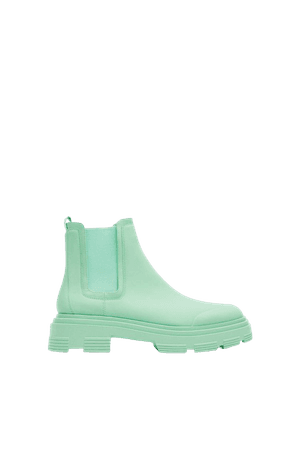 SOLID COLOR RUBBERIZED ANKLE BOOTS | ZARA United States