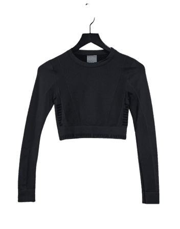 Puma Training Evoknit seamless long sleeve crop top in black | ASOS