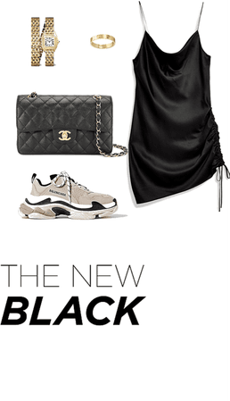 black slip dress and sneakers with a Chanel