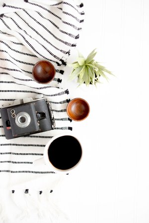 black and gray camera beside on brown wooden bowls photo – Free White Image on Unsplash