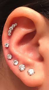 ear with many piercings - Google Search