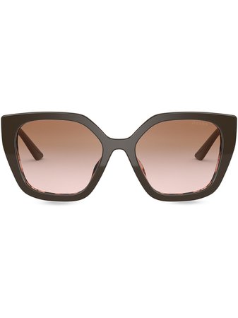 Shop Prada Eyewear polarised oversize sunglasses with Express Delivery - FARFETCH