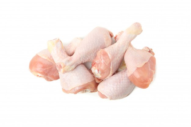 Premium Photo | Raw chicken legs isolated on white space