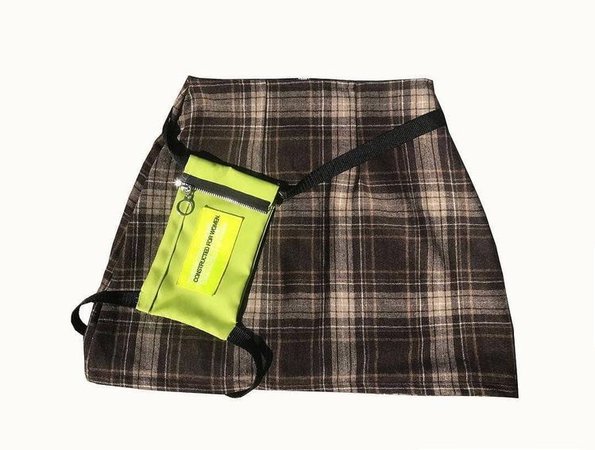 Plaid skirt and harness leg bag from Constructed For Women