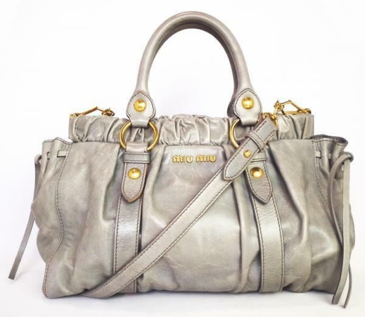 grey beige gold bag purse Miu miu