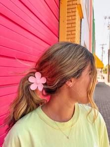 blonde hair in a pink flower claw clip - Google Search