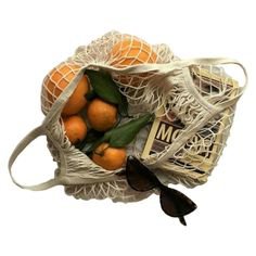 french net shopping grocery bag oranges sunglasses