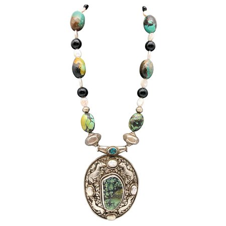 A.Jeschel Marvelous Turquoise necklace with Tibetan Pendant