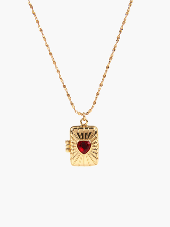 gold and red heart locket