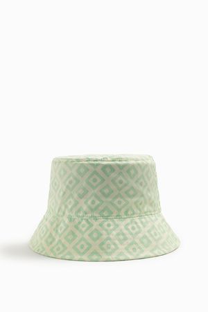 Hat made of lightweight fabric. Wide brim with topstitching detail. - Light green | ZARA United States