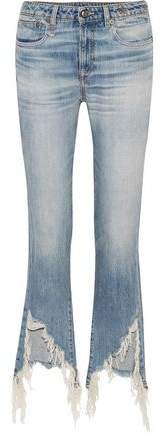 Kick Fit Distressed Mid-rise Flared Jeans