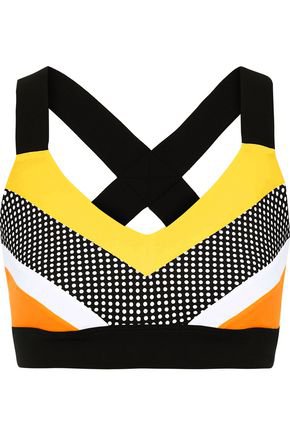Huli Ola perforated striped stretch sports bra | NO KA 'OI | Sale up to 70% off | THE OUTNET