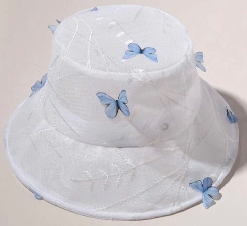 white floral embroidery with blue 3D butterflies