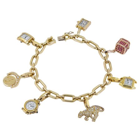 Cartier Gold Seven Detachable Charm Bracelet For Sale at 1stDibs