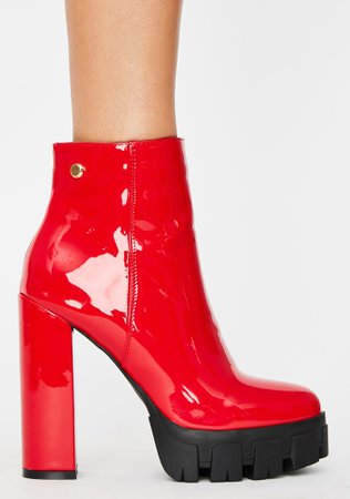 RED PATENT QUAKE HEELED BOOTS