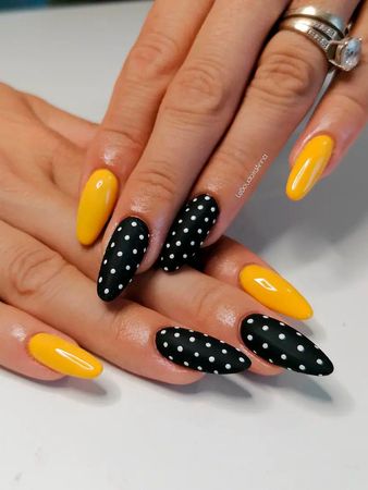 Yellow and black dotty nails white
