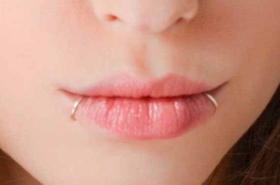 Gold Snake Bite Lip Piercings