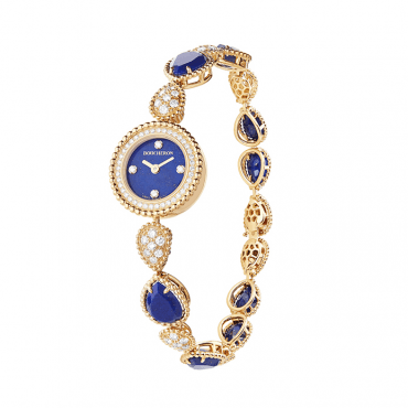 BOUCHERON, SERPENT BOHÈME Jewelry watch in yellow gold with diamonds, lapis lazuli dial with 4 diamonds, diamonds and lapis lazuli paved bracelet