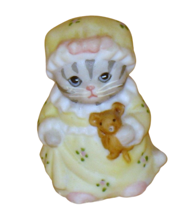 vintage kitty cucumber dressed in yellow night gown thimble