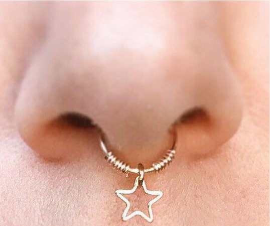 gold nose star piercing