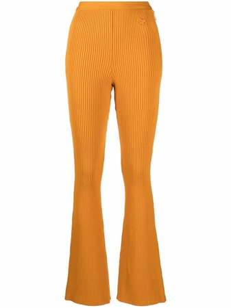 Shop Courrèges ribbed-knit flared trousers with Express Delivery - FARFETCH
