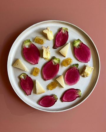 💋 on Instagram: "“Hardcore Romantic”. The colors of this cheese plate remind me of a holiday in Paris, full of love and indulgence. Crisp rainbow radish…"