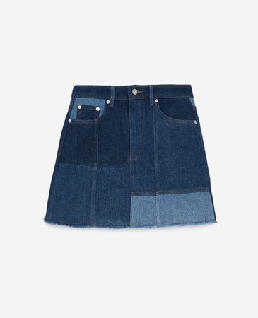 Short blue skirt in denim with patchwork | The Kooples