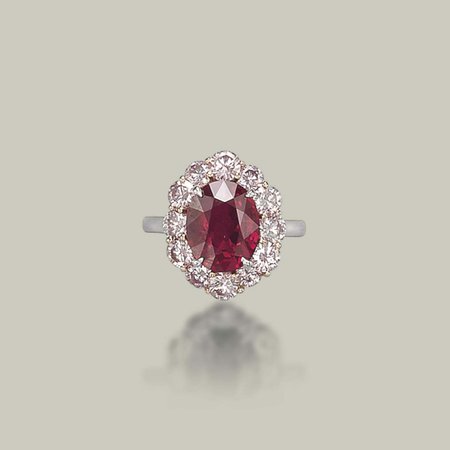 AN EXCEPTIONAL RUBY AND COLOURED DIAMOND RING