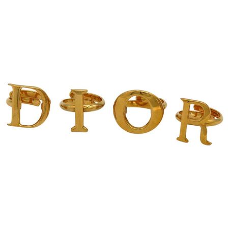 christian dior by john galliano | gold toned dior letter ring set