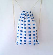 white and blue drawstring bag