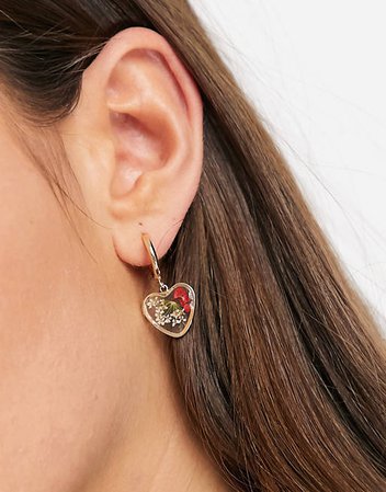 ASOS DESIGN hoop earrings with trapped flower heart charm in gold tone | ASOS