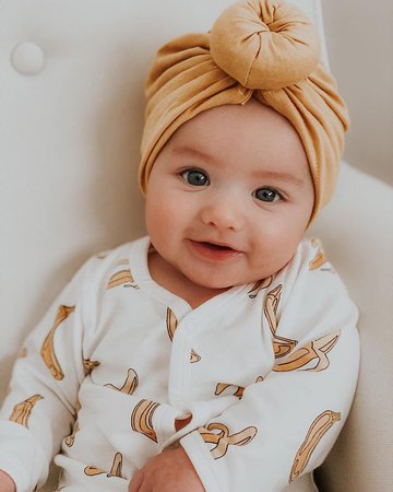 Carolyna Padron Sosa 🍭 on Instagram: “She’s growing so fast it’s BANANAS! Adorable on the go one-piece from our favorite @monicaandandy 🍌🤍✨ #livinlavidaLAYLA…”