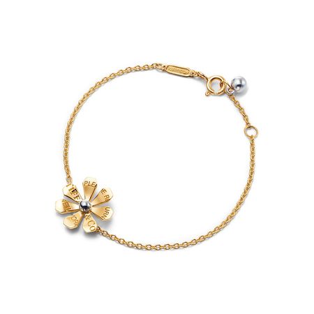 Return to Tiffany® Love Bugs daisy chain bracelet in gold and sterling silver. | Tiffany & Co.