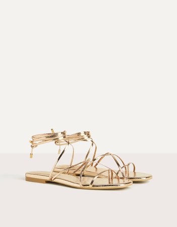 Metallic flat tied sandals. - New - Bershka United States gold