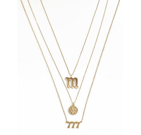 zodiac stacked necklaces