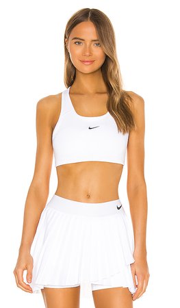 Nike Medium Pad Sports Bra in White & Black | REVOLVE