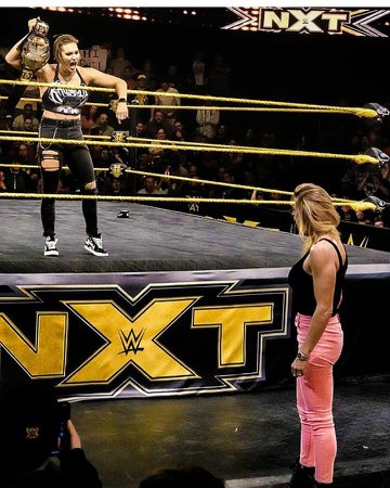 team flairs on Instagram: “Waiting!!! Any guesses??? Triple threat?👀👀👀 #NXT”