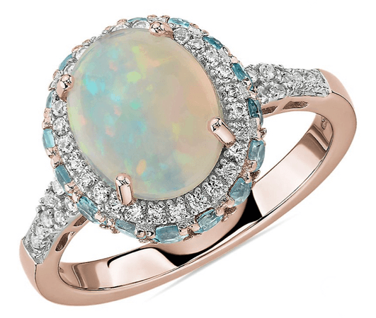 Opal and blue topaz engagement ring