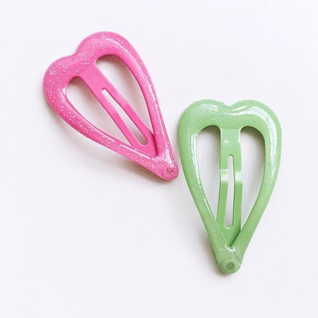 green and pink heart hair clips