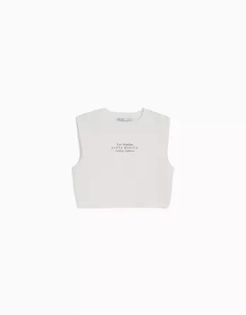 Printed sleeveless T-shirt - New - Woman | Bershka